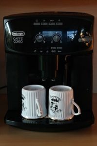 2 glass on coffee machine